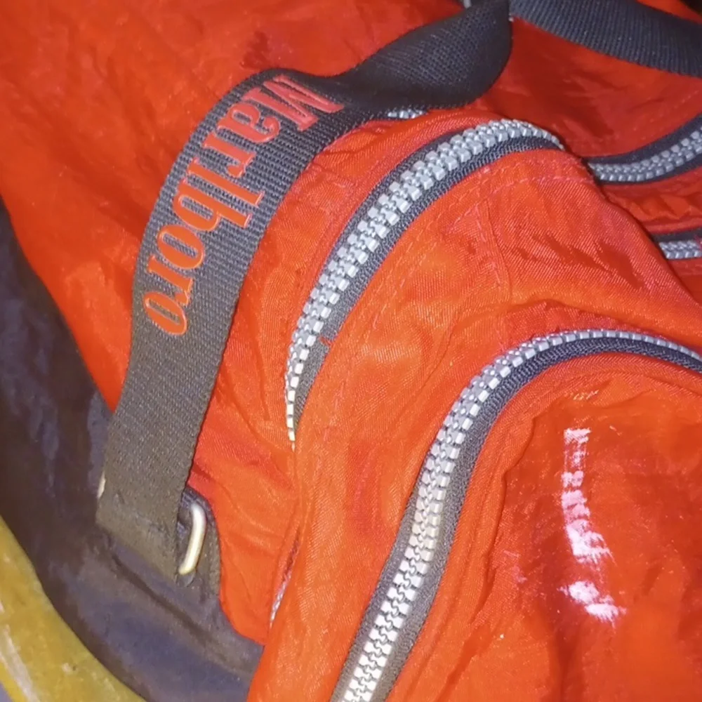 14x10 vintage Marlboro duffel bag with enough space inside and a bonus with all
